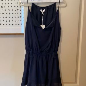 Likely navy dress